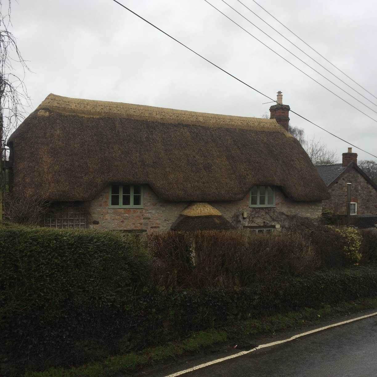 Masterful execution around complex dormer window curves.